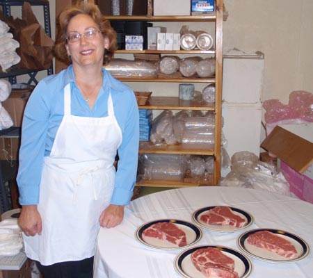 Sharon Jesse with steaks at Old World Meats