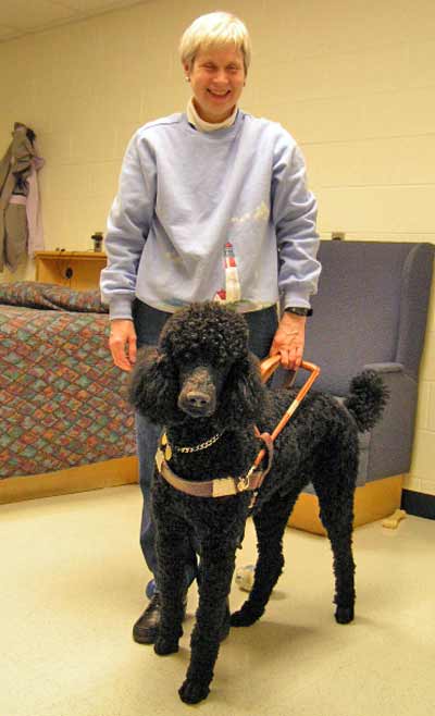 Pam Blizzard with her guide dog Nicholas the poodle