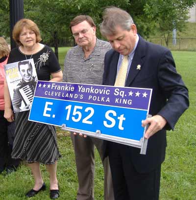 Cecilia Dolgan, president of the National Cleveland-Style Polka Hall of Fame with radio host and Hall of Fame Chairman Tony Petkovsek and Cleveland City Councilman Michael Polensek who initiated the process of naming Frank Yankovic Square