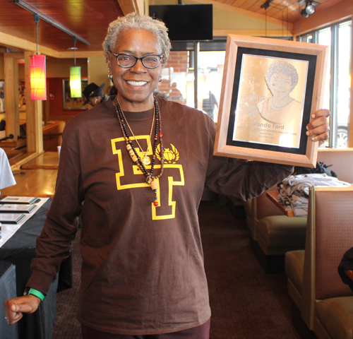 Wanda Ford with Hall of Fame plaque