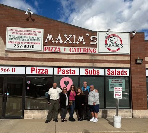 Family outside Maxim's