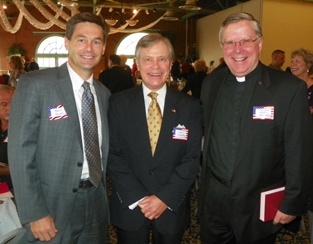 Matt Dolan, Dan Carter and Fr. Howard Humphrey