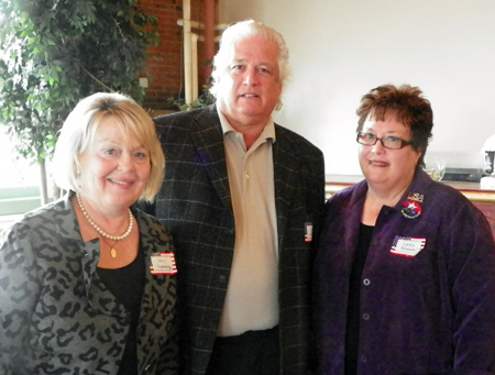 co-chairs Sally Florkiewicz and Lucy Stickan flank Bob Hope