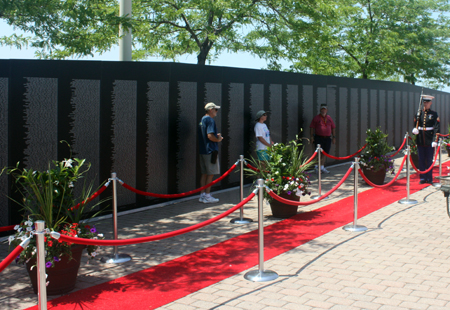 Marine Honor Guard posted at the largest replica of the Vietnam Veterans Memorial Wall during Marine Week in Cleveland