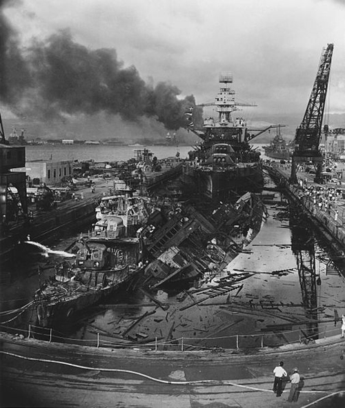 USS Pennsylvania, behind the wreckage of the USS Downes and USS Cassin.