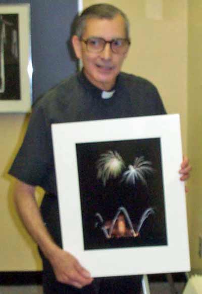 Fr Emmanuel Carreira with one of his photos