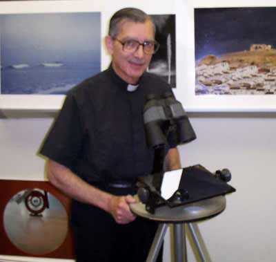 Father Emmanuel Carreira with one of his inventions