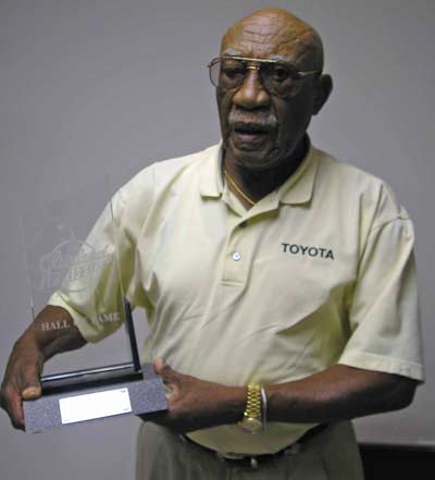 Charlie Sifford with Golf Hall of Fame award