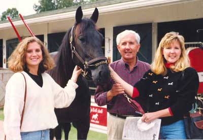 Doug Adair with Mona's daughter Laura and daughter Lynn