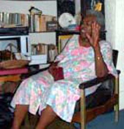 Fannie Lewis at home in chair