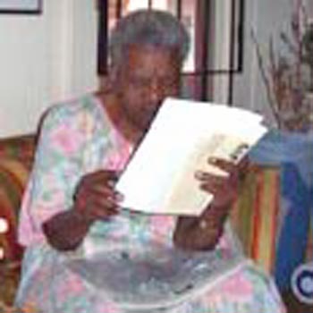 Fannie Lewis doing paperwork