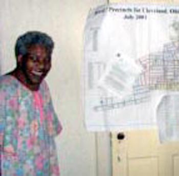Fannie Lewis with a map of her Ward