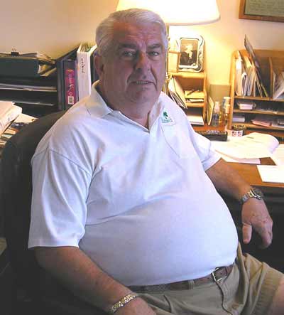 John Feighan in his home office