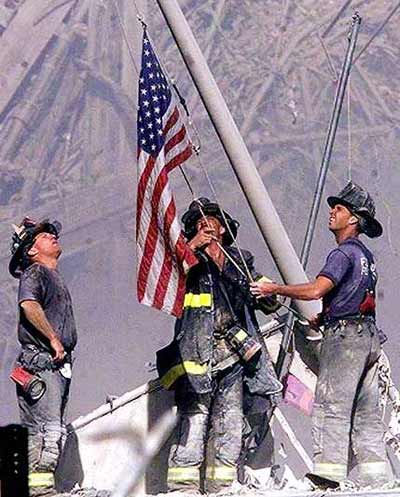 September 11,2001 fireman raising flag