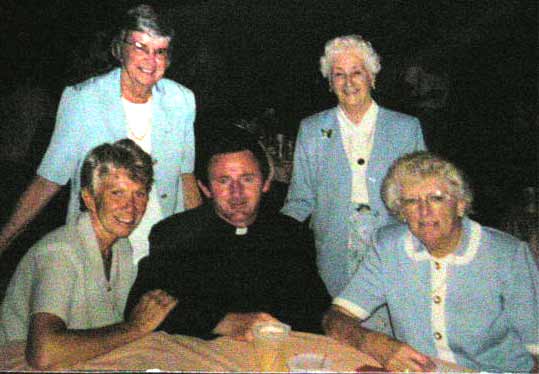 Helen Bacon with Father Devine and friends