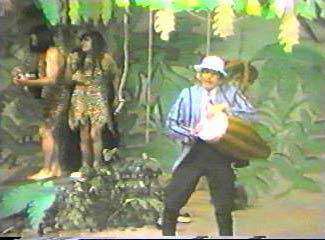 Hoolihan performing in the Guitarzan skit