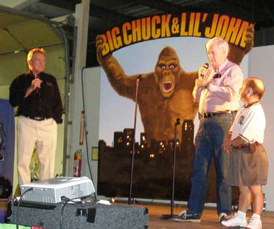 Bob Hoolihan Wells shares a story with Big Chuck Schodowski and Little John Rinaldi at the Ghoulardifest in Medina