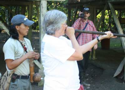 Cindy Cookinham using Blow Gun in the Amazon in 2007