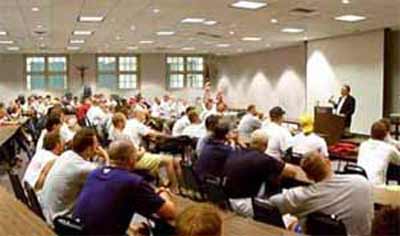 Larry Dolan speaking to JCU athletes