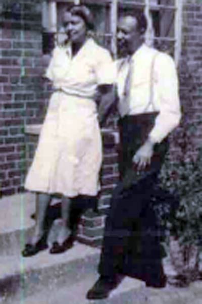 Louis Stokes with his mother Louise at 4301 Case Court (their home in The Projects)