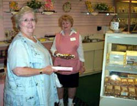 Adele Malley and worker at Malley's Chocolates