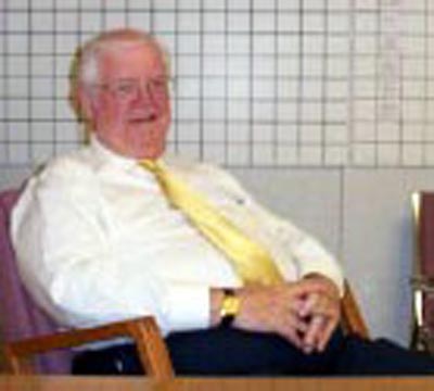 Bill Malley at desk