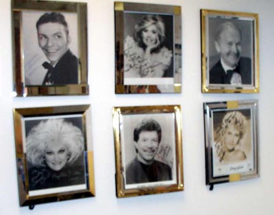 Photos of some of Marty Conn's friends like Frank Sinatra and Phyllis Diller