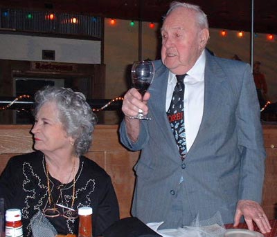 Ed Mugridge making a toast at Tom and Pat's 25th anniversary party