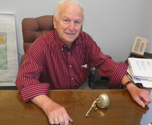 Nacy Panzica at his desk