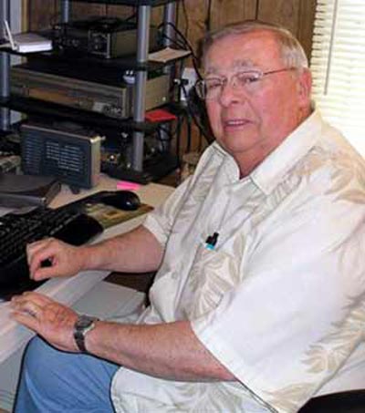 Neil Zurcher at his desk - photo by Debbie Hanson