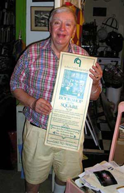 Richard Gildenmeister with sign from his store