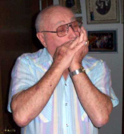 David Spevack playing the harmonica