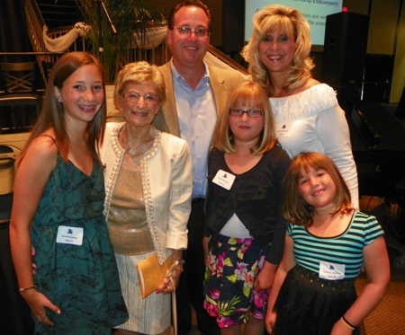 Violet Spevack with great grandchildren Melanie, Danielle and Samantha and grandson Mark Chisling and his wife Stepahnie