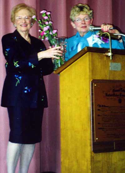 Violet Spevack receiving an award