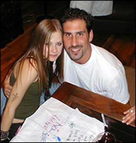 Dan Swingos with singer Avril Lavigne