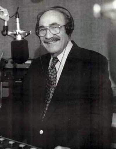 Ted Hallaman at the mic at WRMR in 2002