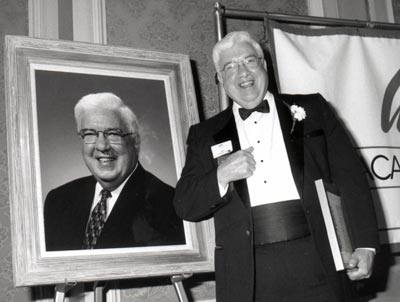 Dr. Ted Castele receiving an award