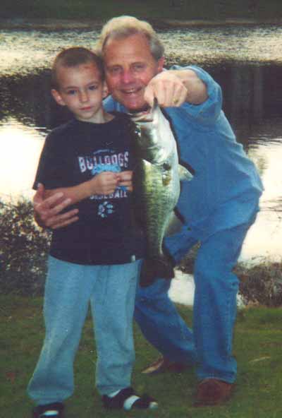 Tim Taylor and grandson fishing