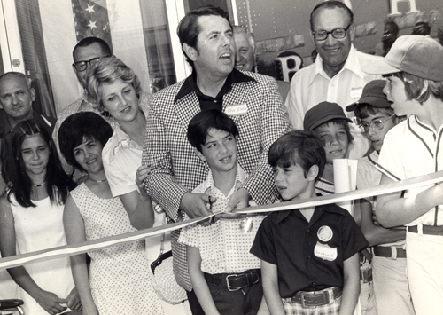 Tom Eakin cuts ribbon of Cy Young Museum