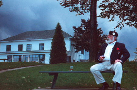 Tony Sumodi in Scotland with whisley and cigar