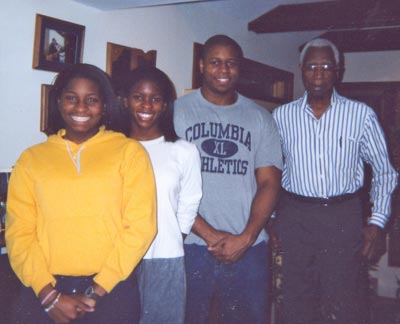 Virgil Brown with 3 of his 7 grandchildren